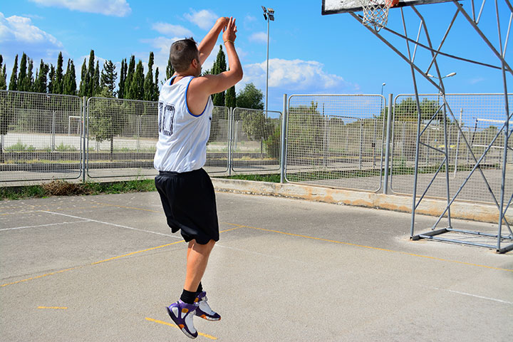 basketball jump on basketball court 
